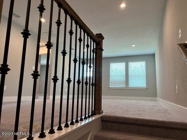 60 Pine Forest Court St. Augustine, FL 32092 - Photo 18 of 26 a view of an entryway with staircase