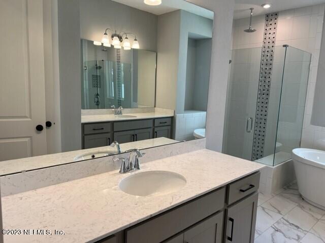 60 Pine Forest Court St. Augustine, FL 32092 - Photo 10 of 26 a bathroom with a sink and a mirror