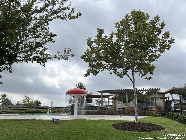232 Colebrook Way Cibolo, TX 78108 - Photo 32 of 36 a front view of a house with a garden