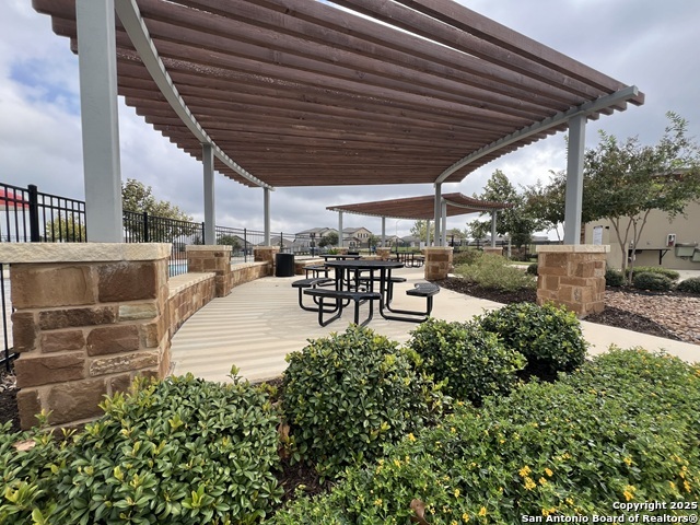 232 Colebrook Way Cibolo, TX 78108 - Photo 34 of 36 a patio with table and chairs