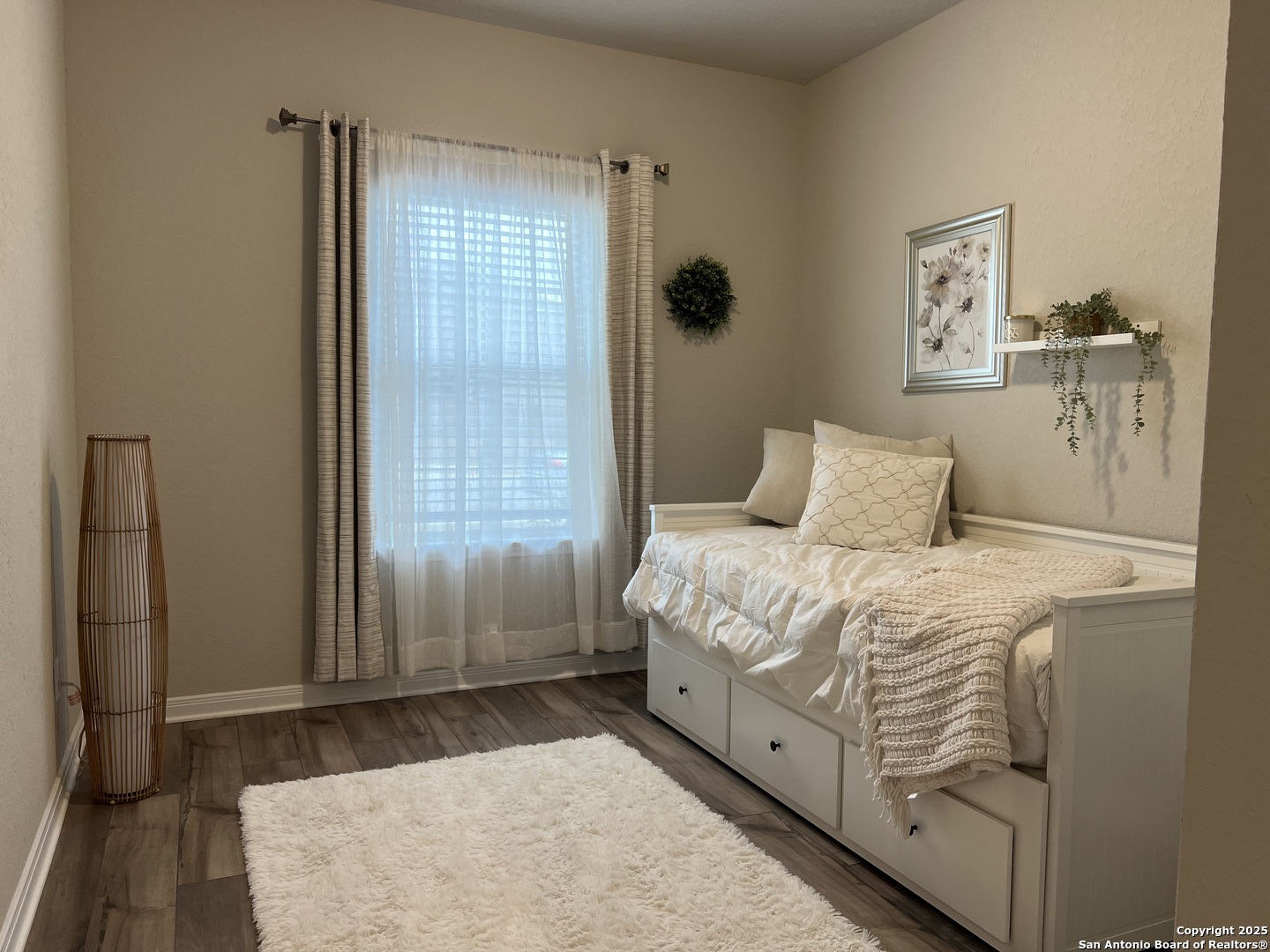 232 Colebrook Way Cibolo, TX 78108 - Photo 6 of 36 a bedroom with a bed and a window