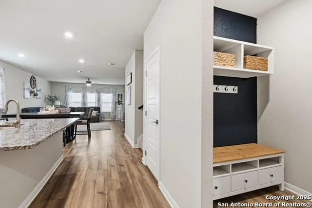 a view of a kitchen from the hallway