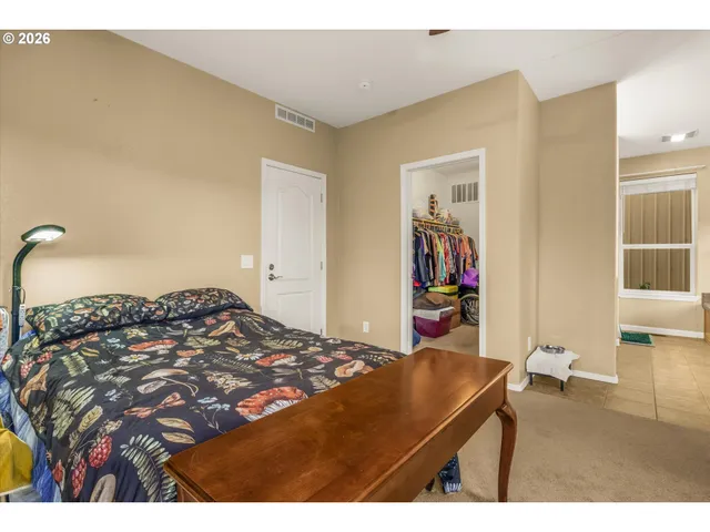 a bathroom with a sink double vanity and a mirror