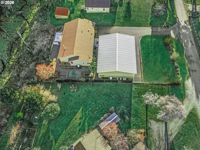 a view of a lake with a yard