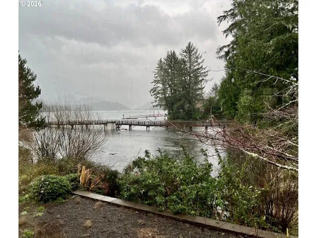 a sign that is on the side of the street