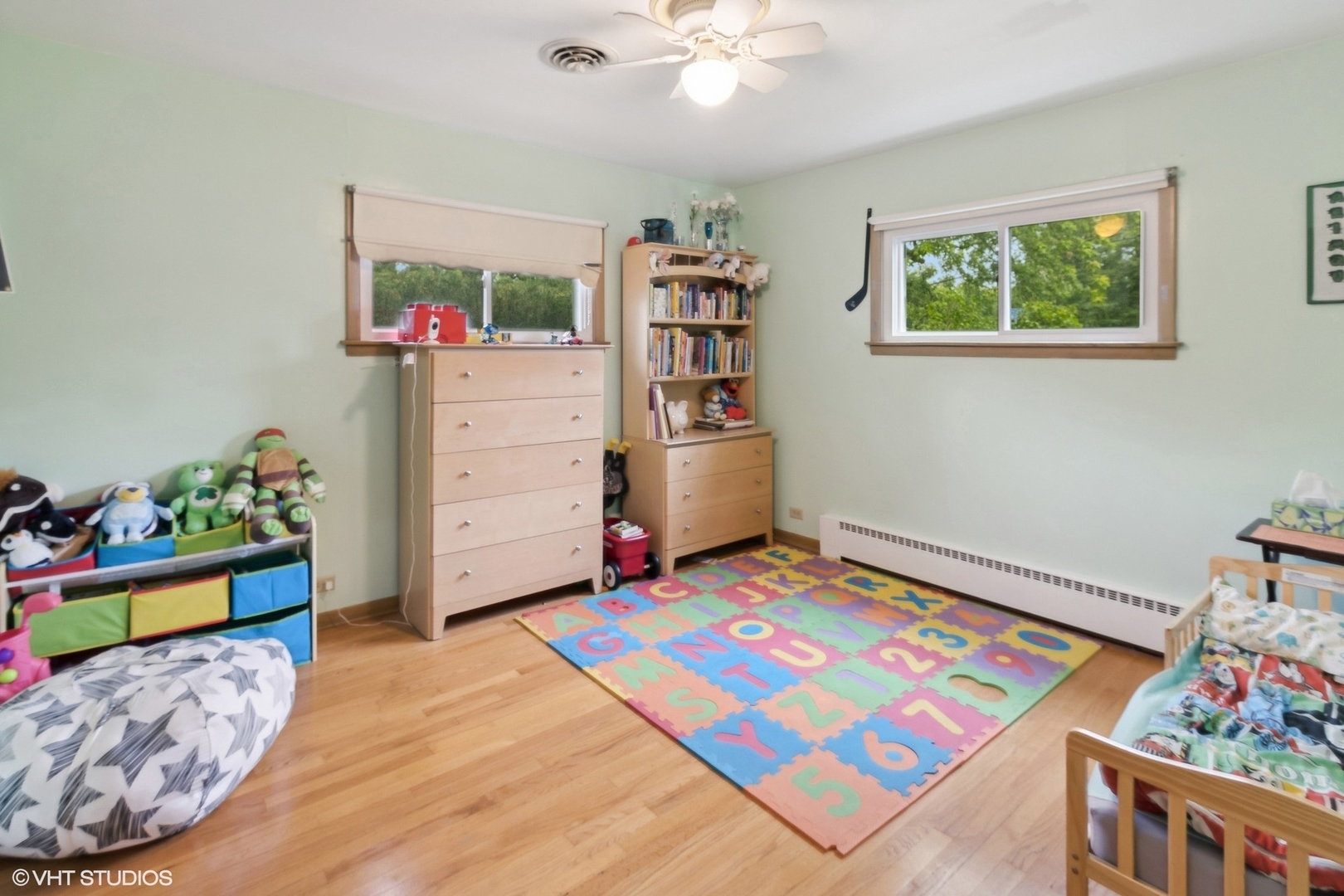 247 South Church Road Bensenville, IL 60106 - Photo 14 of 18 a bedroom with a bed and cabinets
