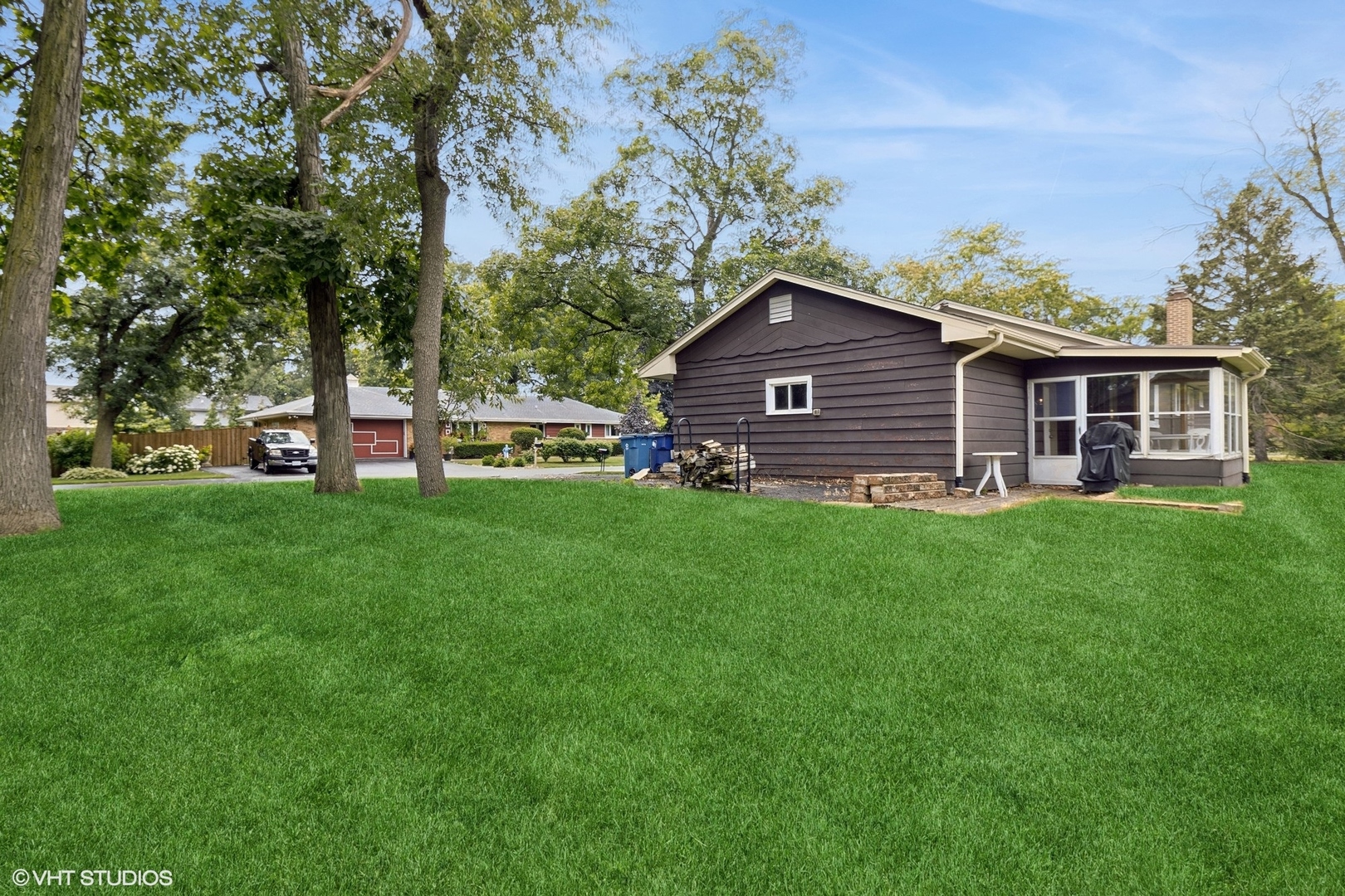 247 South Church Road Bensenville, IL 60106 - Photo 2 of 18 a view of a house with a yard porch and sitting area