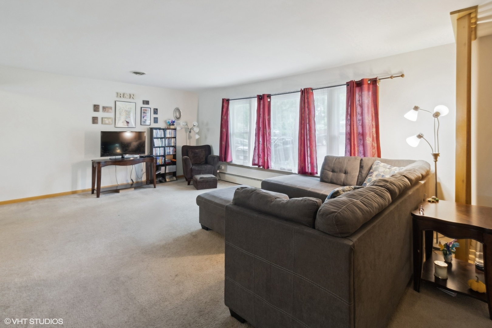 247 South Church Road Bensenville, IL 60106 - Photo 4 of 18 a living room with furniture and a large window