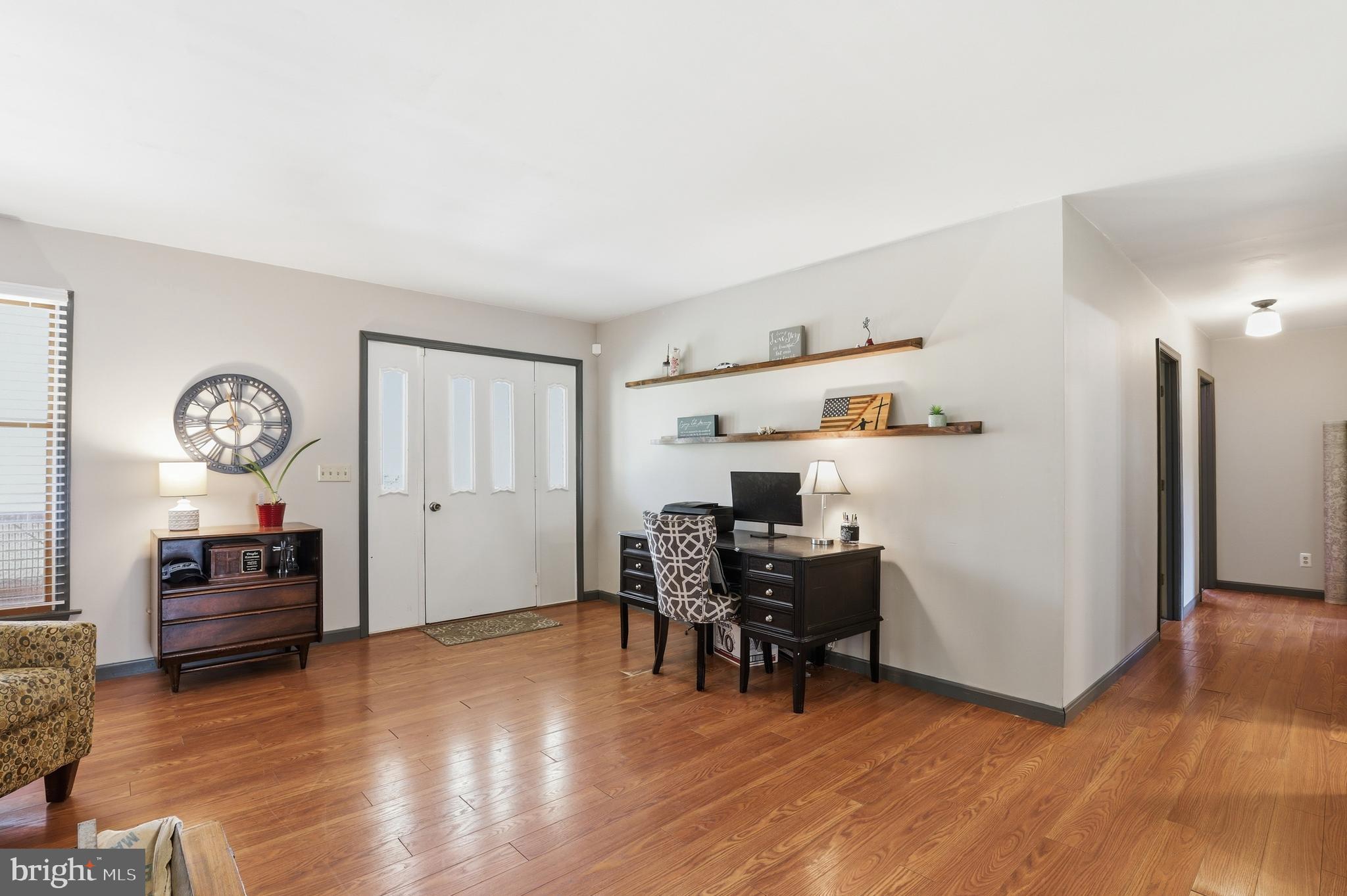 228 Firetower Road Camden Wyoming, DE 19934 - Photo 12 of 39 a view of livingroom with furniture and wooden floor