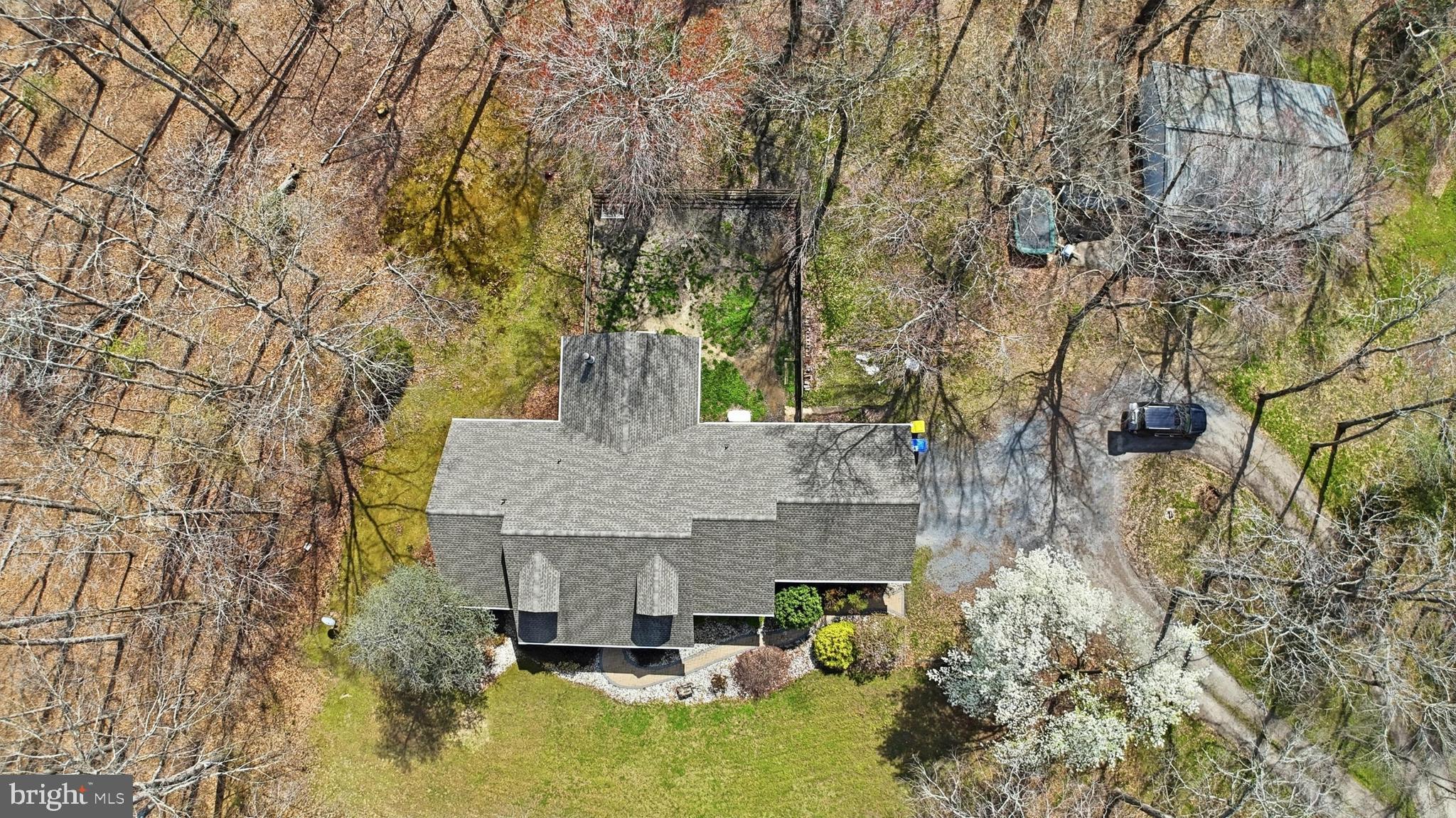 228 Firetower Road Camden Wyoming, DE 19934 - Photo 2 of 39 a view of house with yard and sitting area