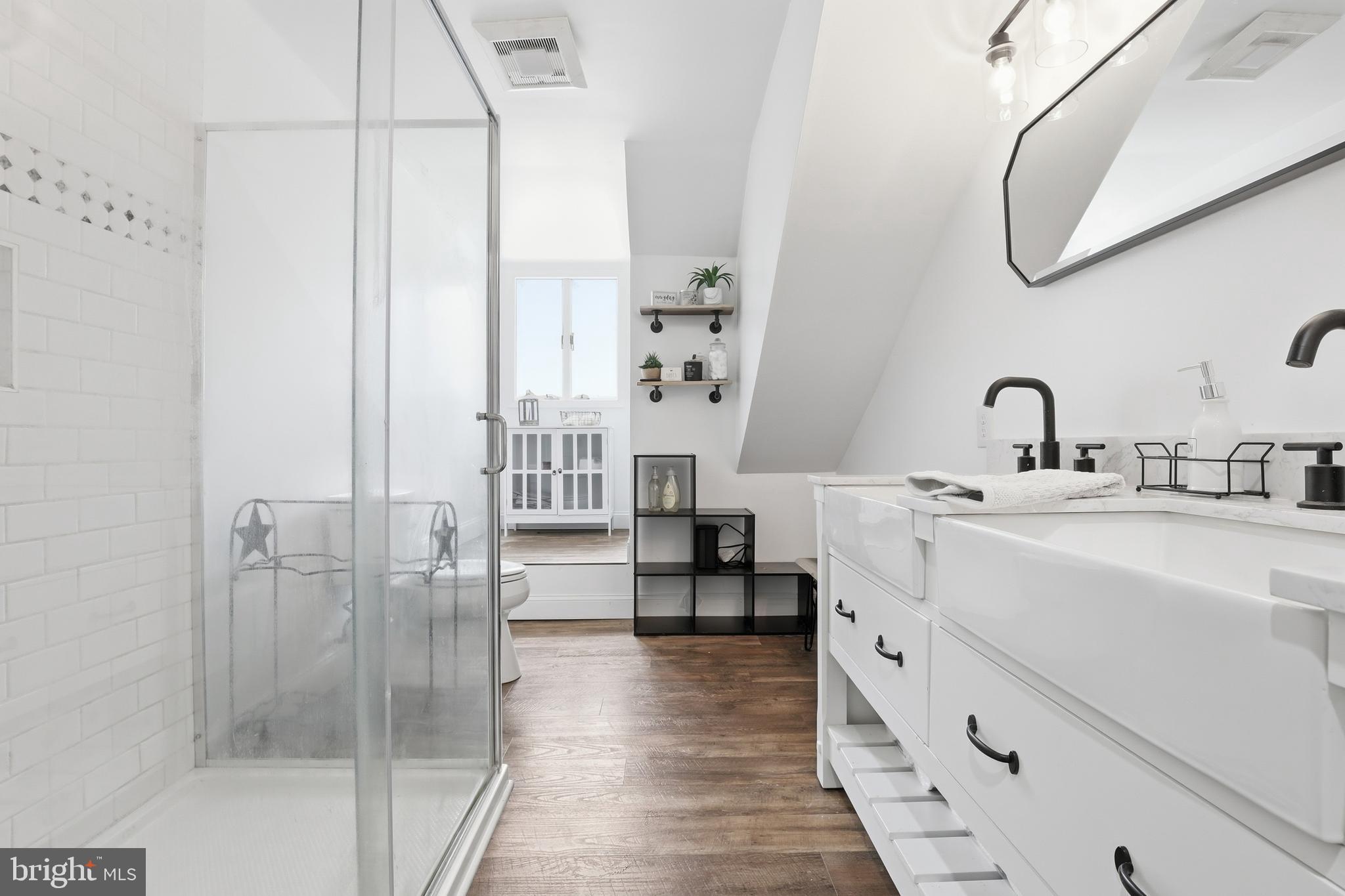 228 Firetower Road Camden Wyoming, DE 19934 - Photo 30 of 39 a bathroom with a sink and a mirror