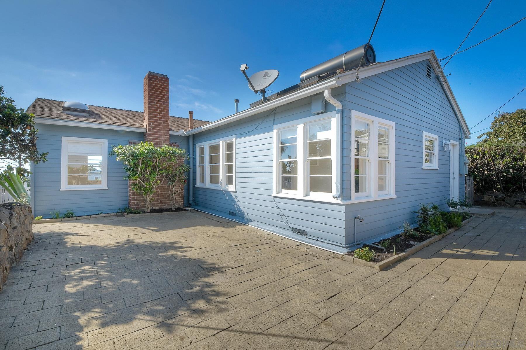 855 Dewitt Avenue Encinitas, CA 92024 - Photo 23 of 23 a front view of a house with garden