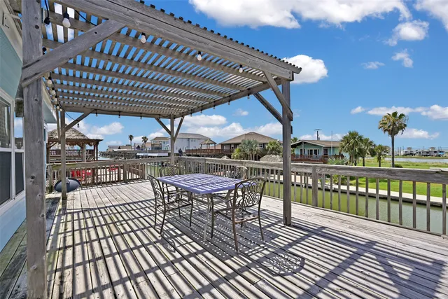 a view of a chairs and tables in the balcony