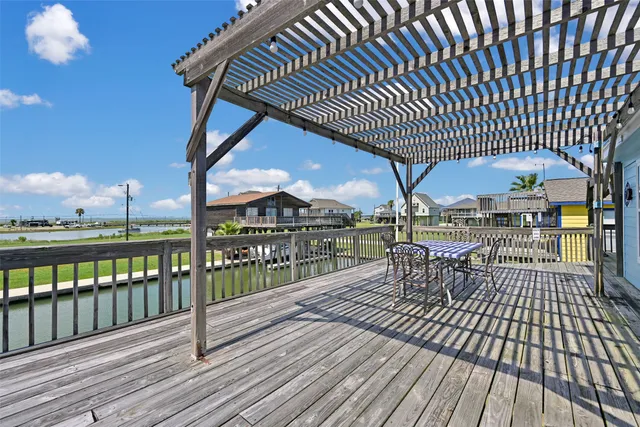 a view of a chairs on the roof deck