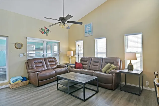 a living room with furniture and a window