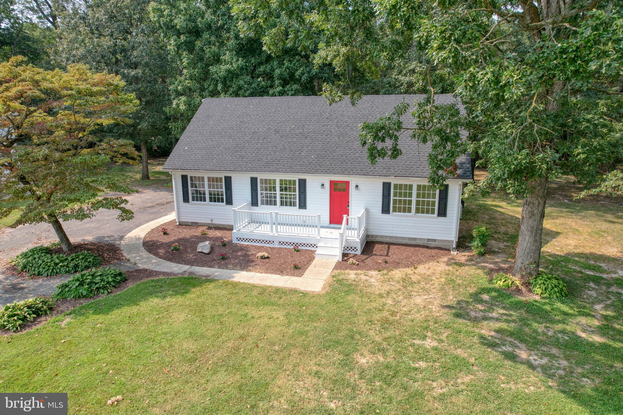 23678 Willow Pond Road Denton, MD 21629 - Photo 2 of 51 an aerial view of a house with swimming pool garden and patio