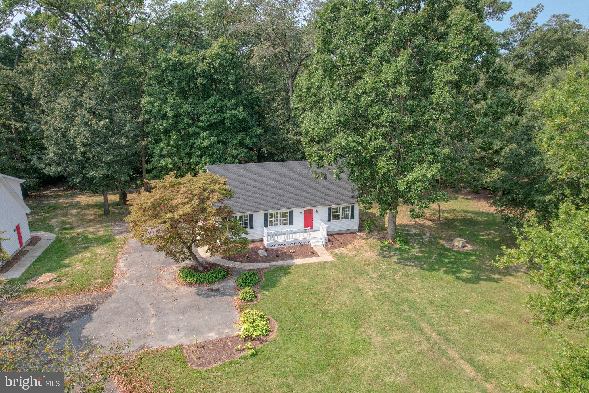 23678 Willow Pond Road Denton, MD 21629 - Photo 3 of 51 a view of a house with a yard