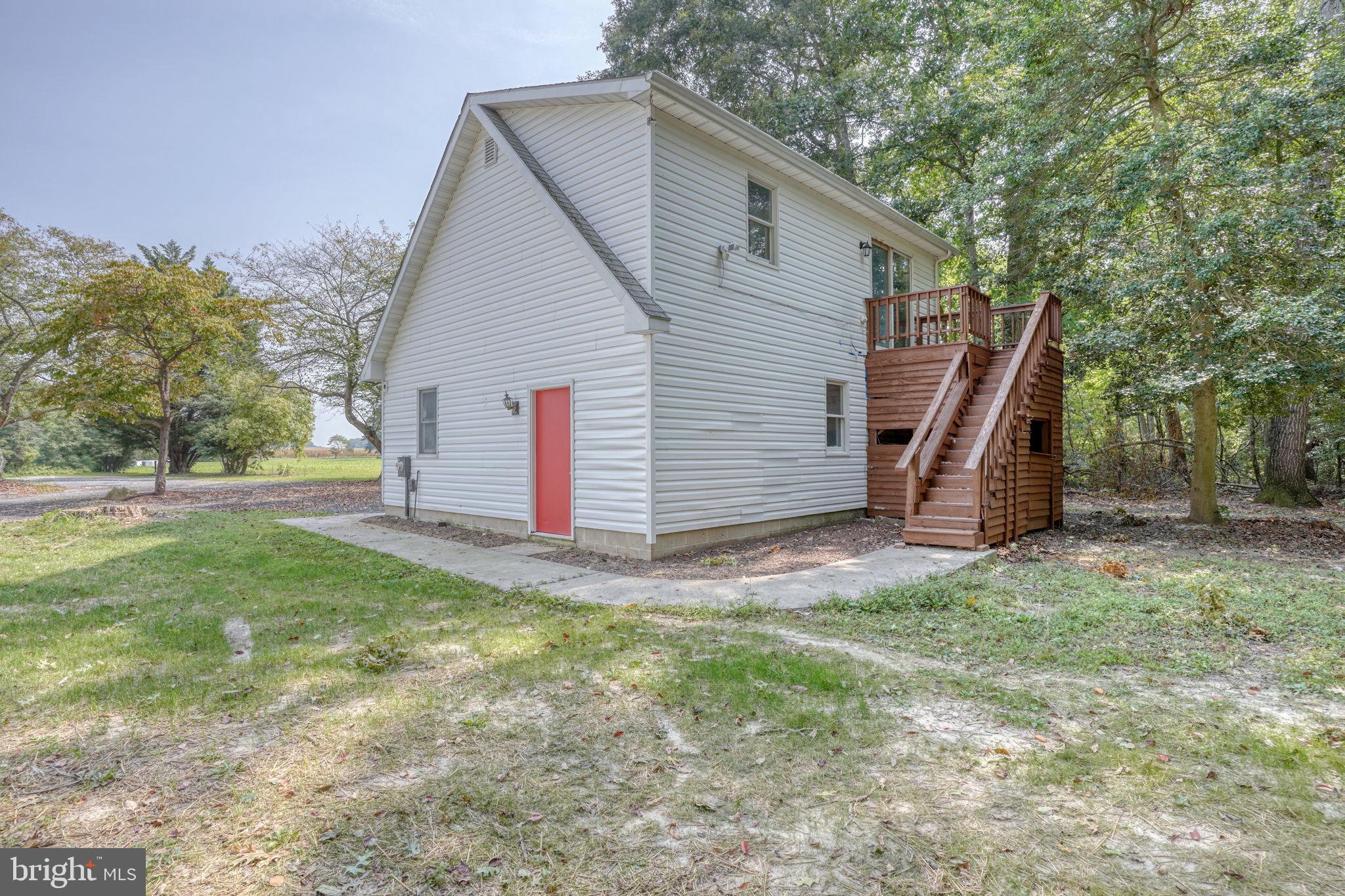 23678 Willow Pond Road Denton, MD 21629 - Photo 35 of 51 a view of a back yard of the house