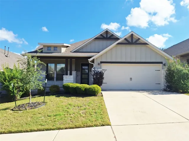 a house view with a garden space