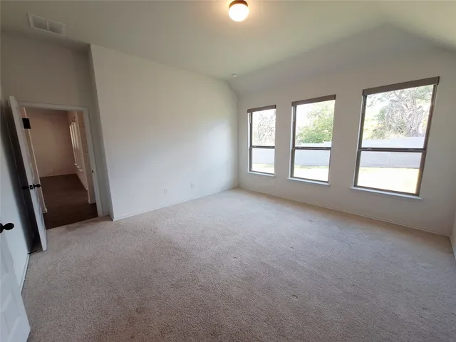 a view of a room with windows