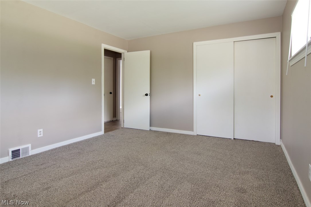 4279 Tapper Road Barberton, OH 44203 - Photo 15 of 27 Master bedroom closet has sliding doors.