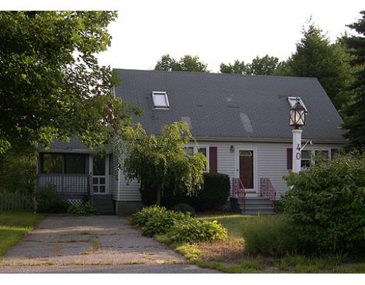 40 Shawnee Road Pepperell, MA 01463 - Photo 1 of 1 a view of a house with a garden