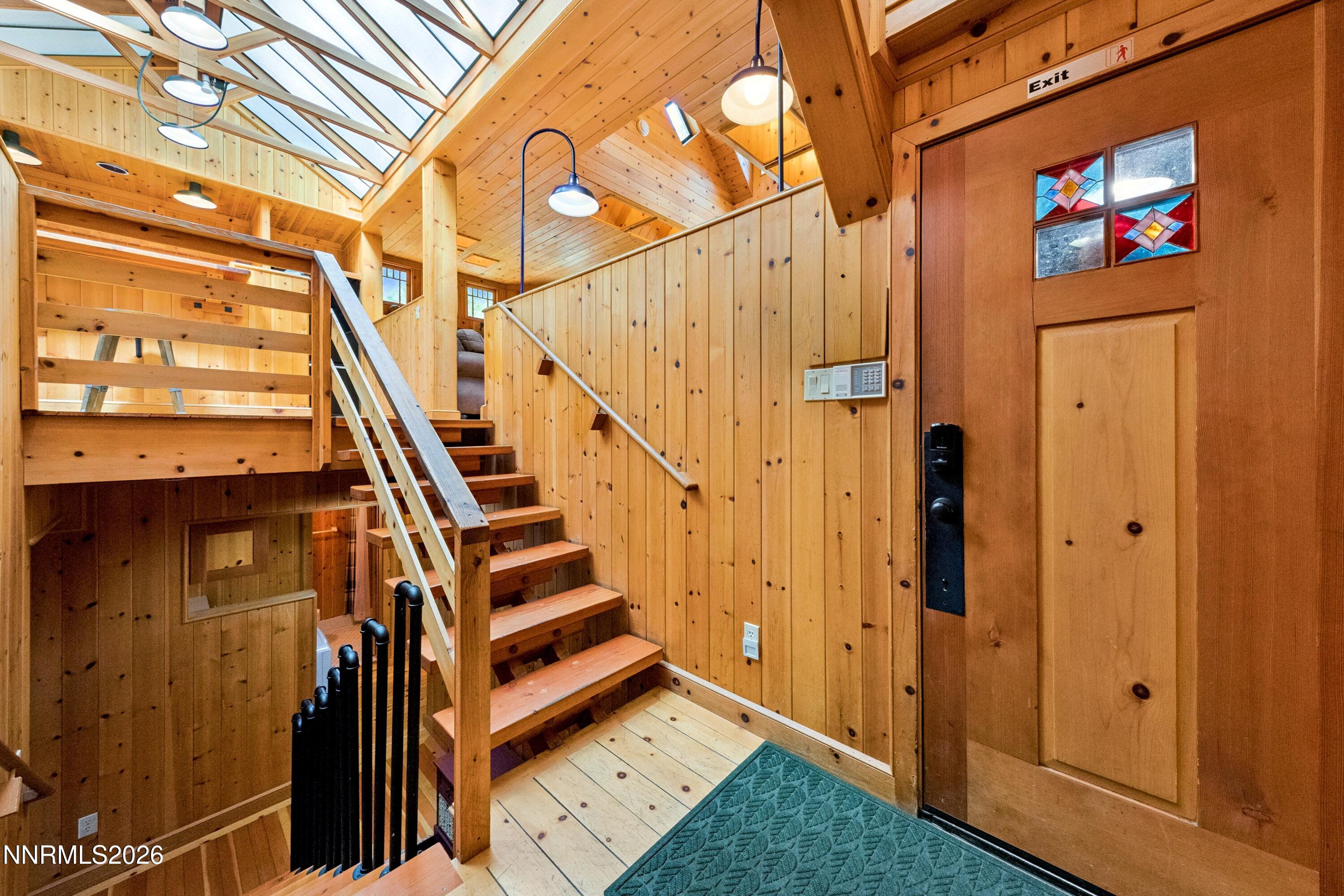 706 Gary Lane, Unit B OR 2 Stateline, NV 89449 - Photo 2 of 26 a view of an entryway with staircase