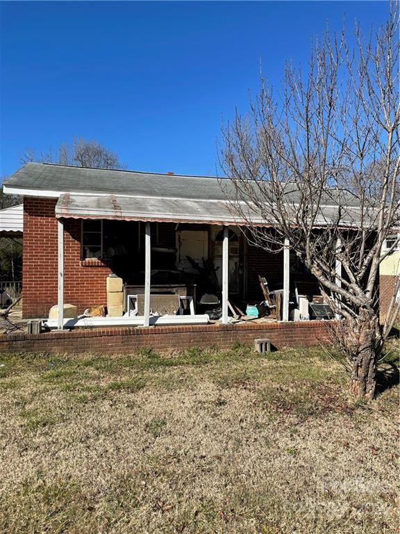 6230 Old Mocksville Road Salisbury, NC 28144 - Photo 1 of 2 a view of a house with a yard and sitting area