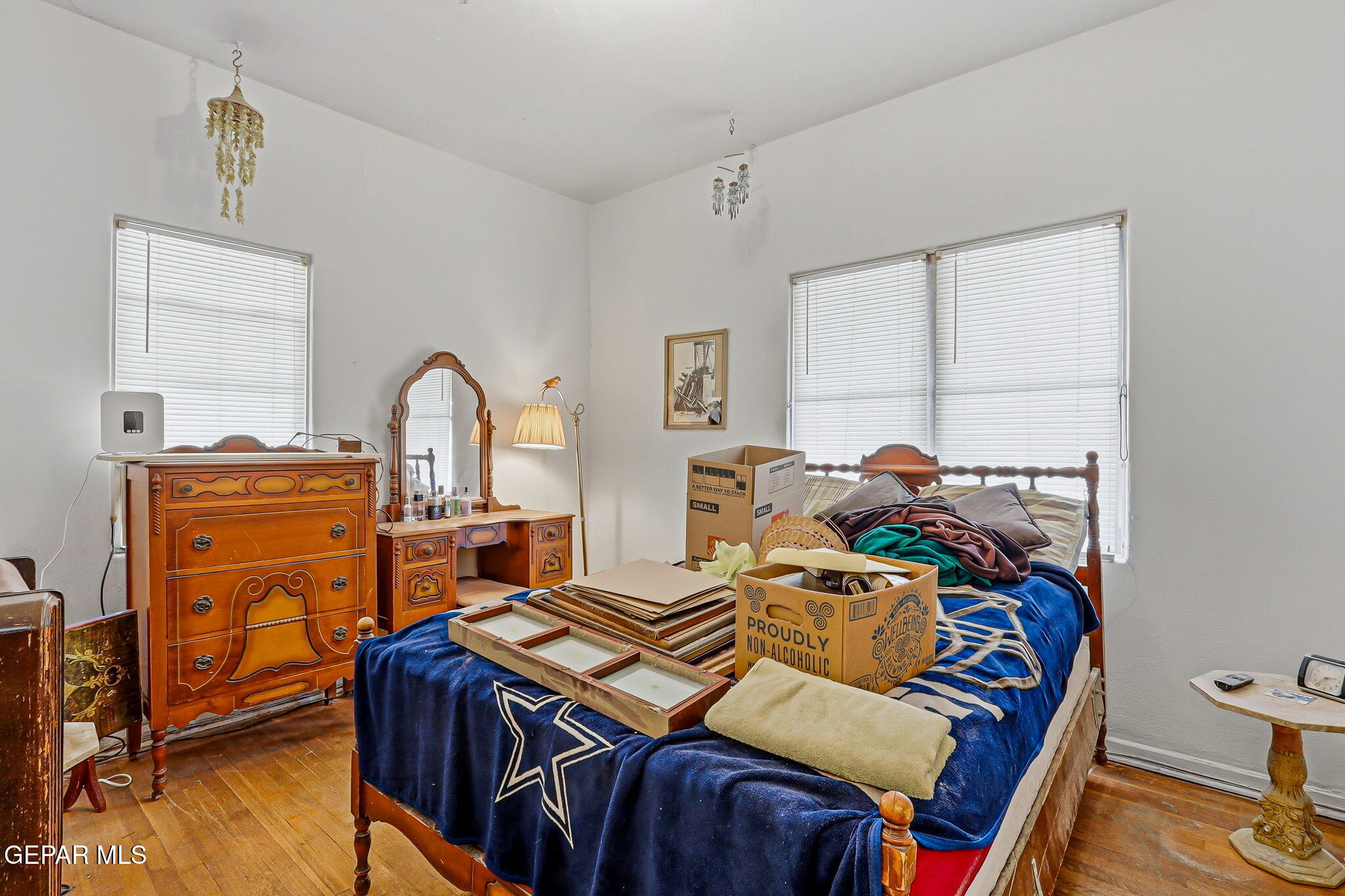 4333 Pershing Drive El Paso, TX 79903 - Photo 17 of 75 a bed room with a bed and a dresser