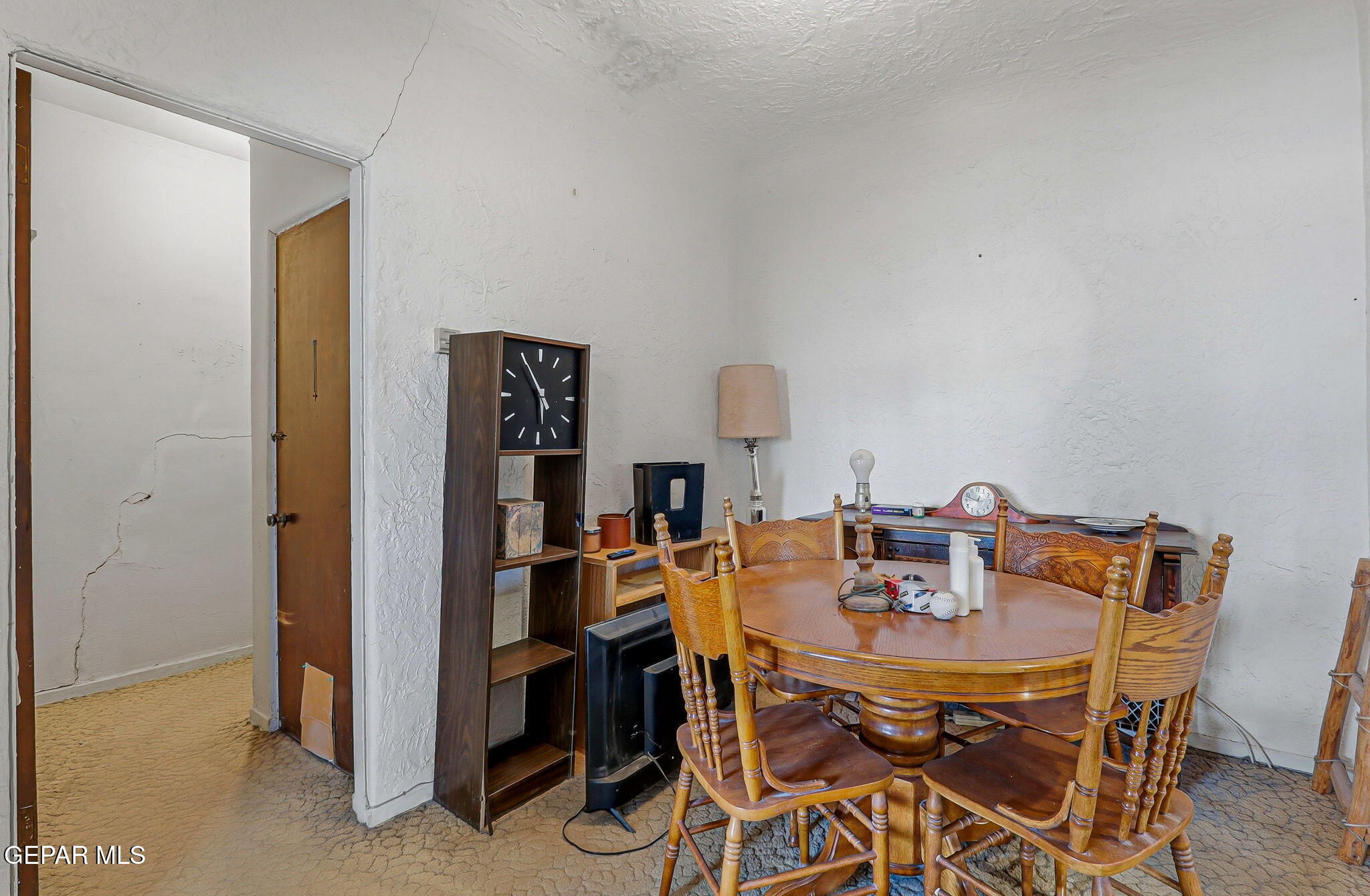 4333 Pershing Drive El Paso, TX 79903 - Photo 28 of 75 a view of a dining room with furniture and a chandelier