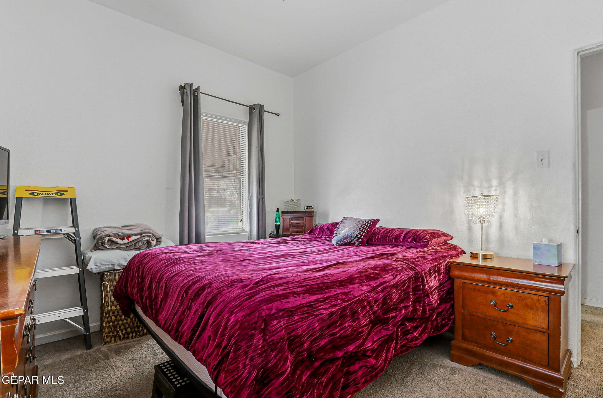 4333 Pershing Drive El Paso, TX 79903 - Photo 39 of 75 a bedroom with a bed and window