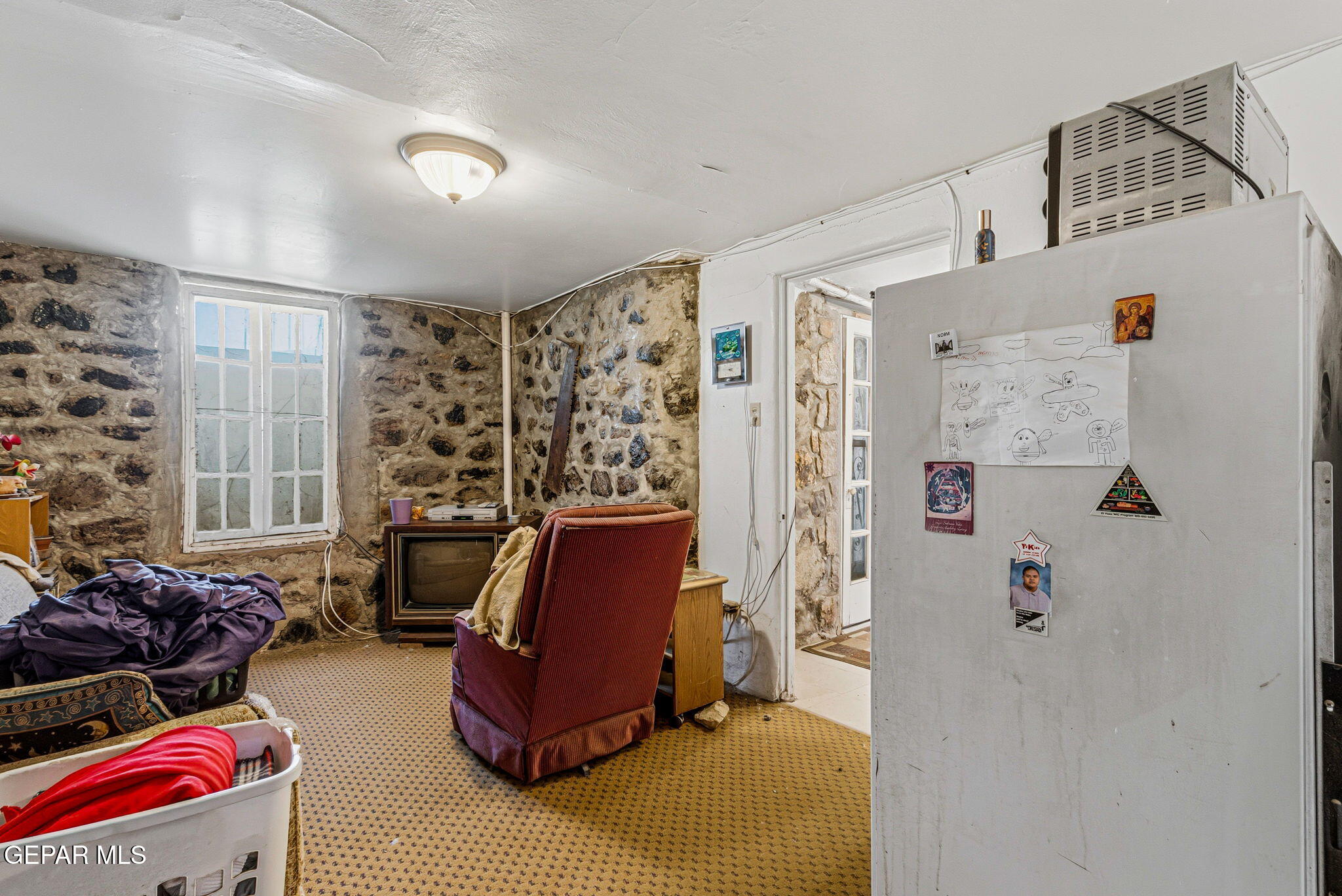 4333 Pershing Drive El Paso, TX 79903 - Photo 56 of 75 a view of a workspace with furniture and a window