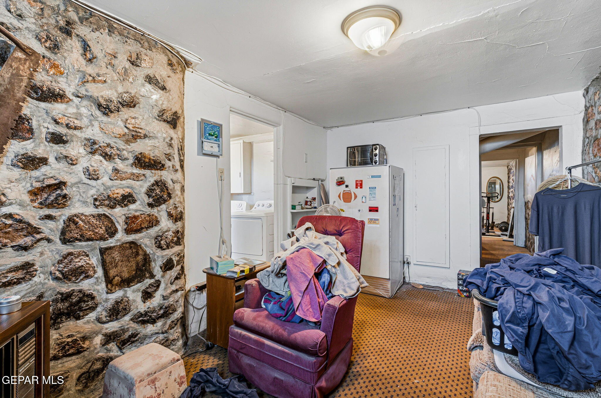 4333 Pershing Drive El Paso, TX 79903 - Photo 57 of 75 a bedroom with a bed and a couch