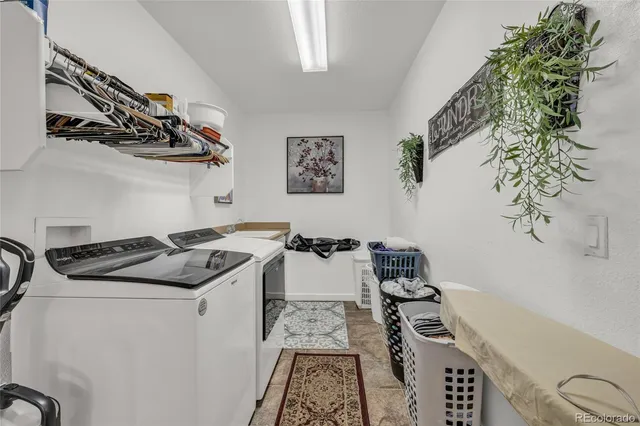 a white stove top oven sitting next to a window
