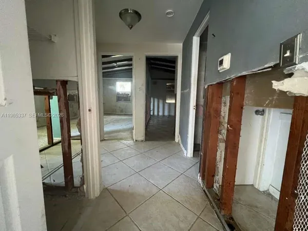 a bathroom with a shower and a tub