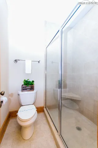 a bathroom with a tub and a window