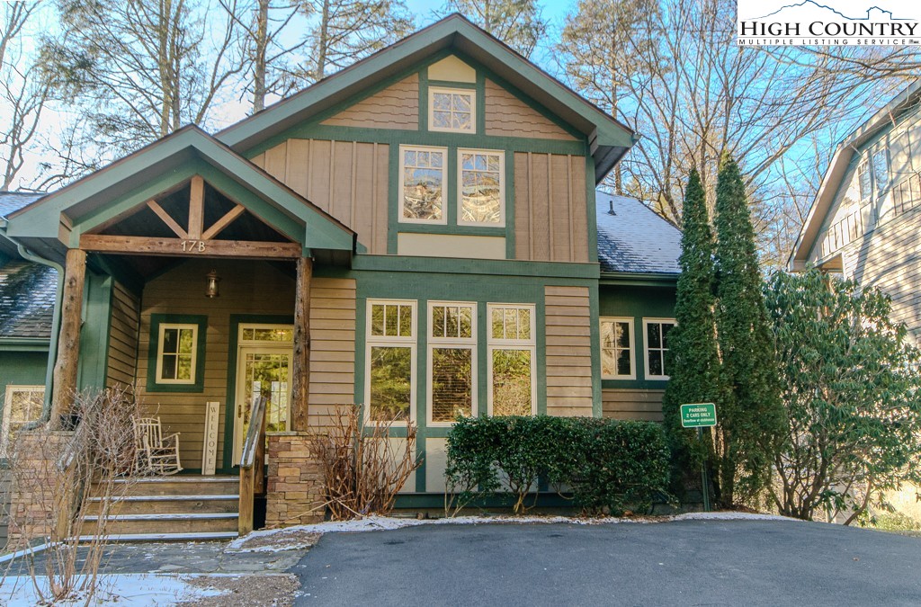 145 Rising Fawn Pass, Unit 17B Boone, NC 28607 - Photo 47 of 49 a front view of a house with a yard