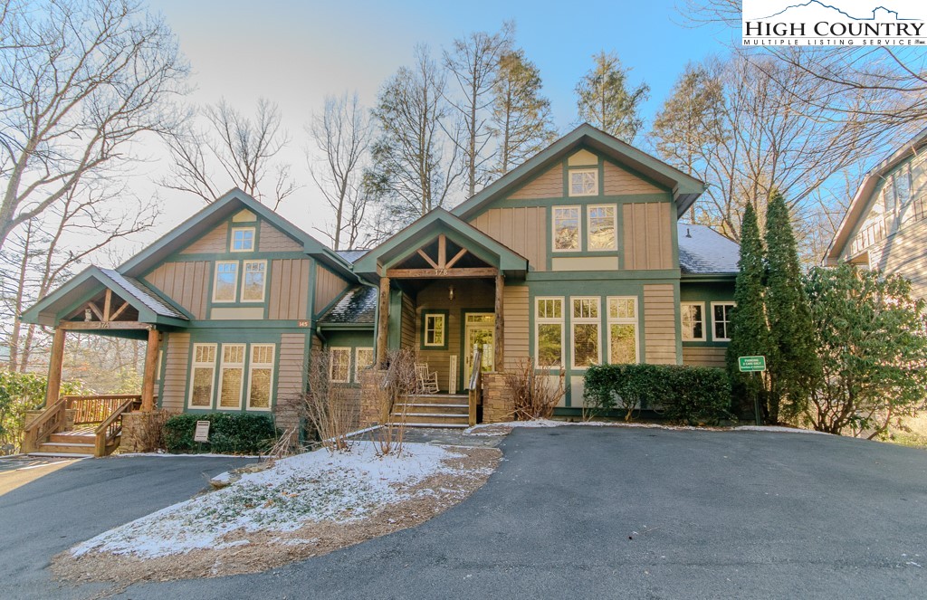145 Rising Fawn Pass, Unit 17B Boone, NC 28607 - Photo 49 of 49 a front view of a house with garden