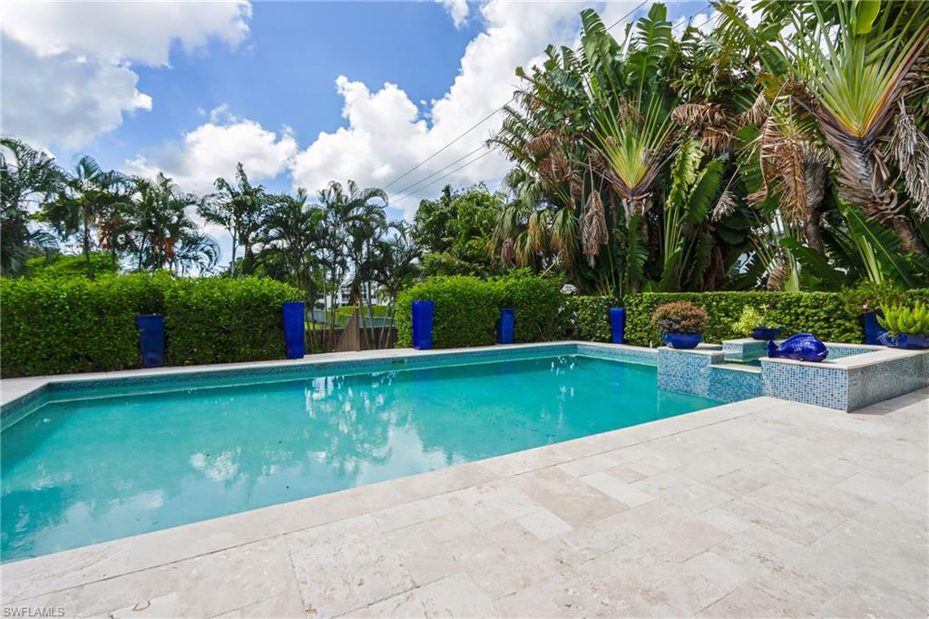 678 11th Avenue South Naples, FL 34102 - Photo 31 of 34 a view of a garden with houses