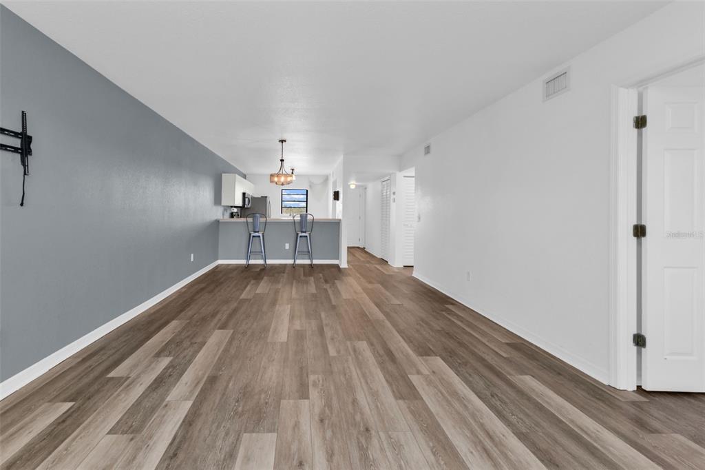 175 Kings Highway, Unit B6526 Punta Gorda, FL 33983 - Photo 11 of 44 a view of empty room with wooden floor