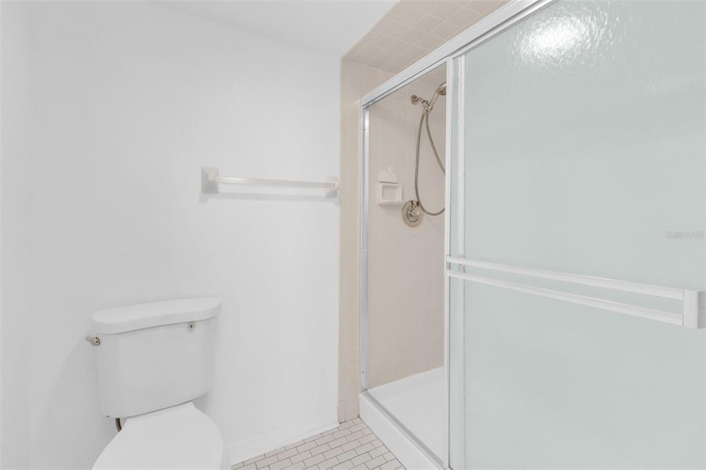 175 Kings Highway, Unit B6526 Punta Gorda, FL 33983 - Photo 15 of 44 a bathroom with a toilet and shower