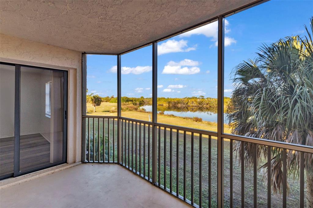 175 Kings Highway, Unit B6526 Punta Gorda, FL 33983 - Photo 25 of 44 a view of a glass door and the balcony