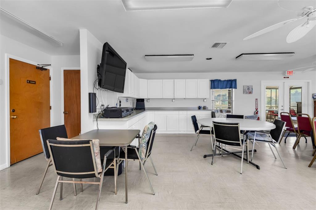 175 Kings Highway, Unit B6526 Punta Gorda, FL 33983 - Photo 32 of 44 a view of a dining room with furniture and a window