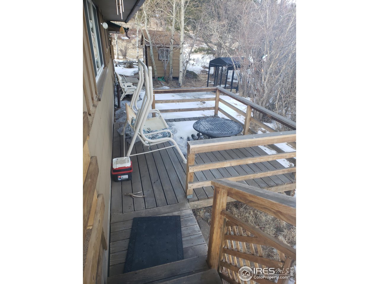 88 Cimarron Road Red Feather Lakes, CO 80545 - Photo 16 of 26 back deck