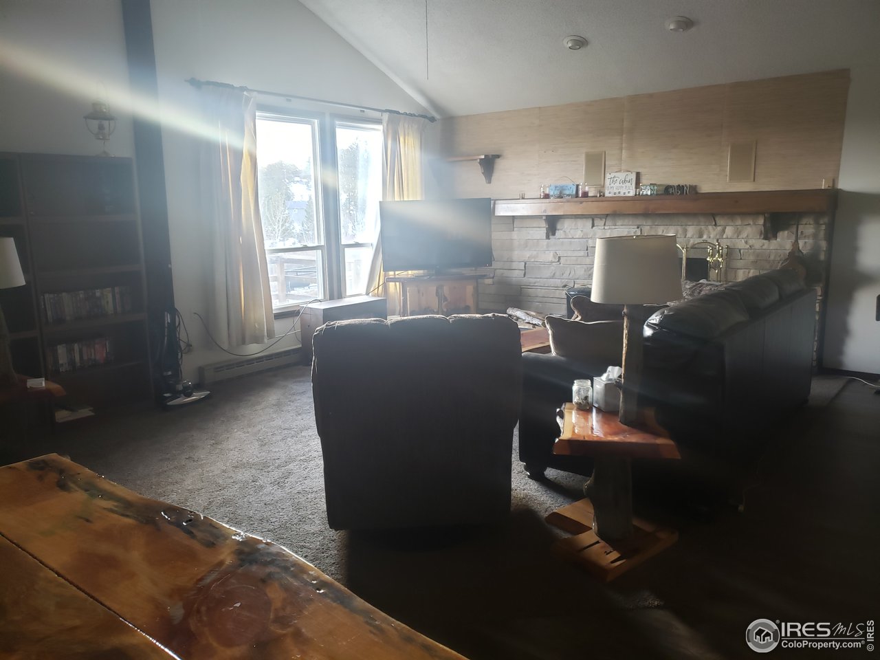 88 Cimarron Road Red Feather Lakes, CO 80545 - Photo 3 of 26 sunny living room