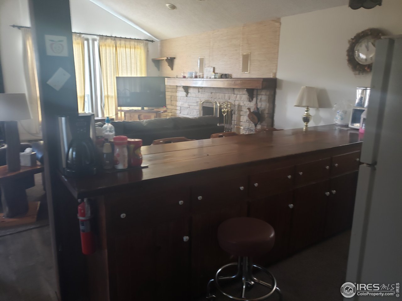88 Cimarron Road Red Feather Lakes, CO 80545 - Photo 5 of 26 kitchen bar