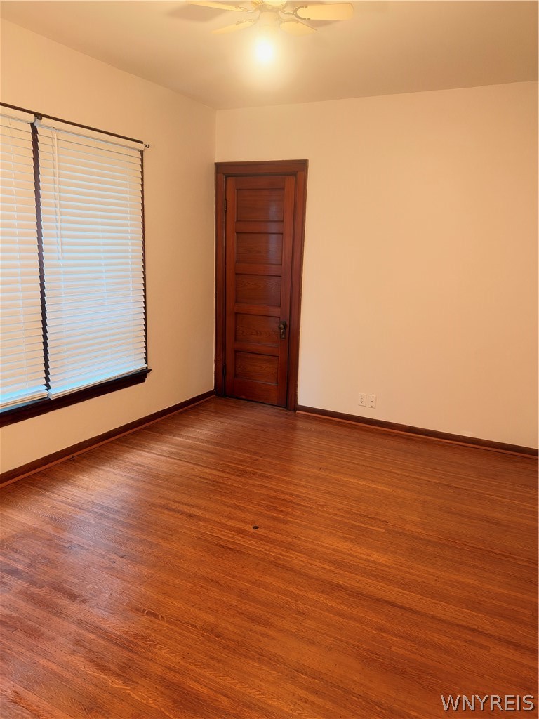 166 Herkimer Street Buffalo, NY 14213 - Photo 3 of 13 Rich hardwood floors and classic wood trim define