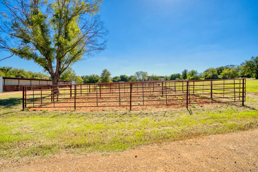 247 South Caddo Street Lipan, TX 76462 - Photo 11 of 29 a view of swimming pool with an outdoor seating