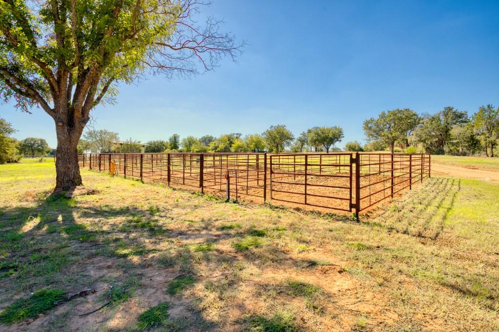 247 South Caddo Street Lipan, TX 76462 - Photo 12 of 29 a view of swimming pool with an outdoor seating