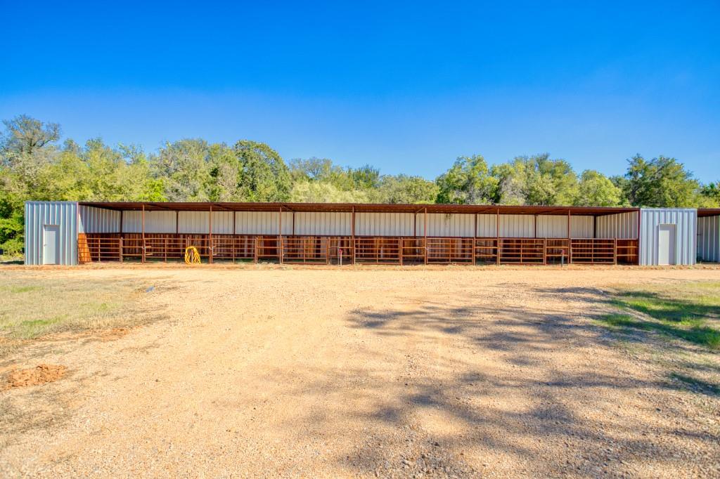 247 South Caddo Street Lipan, TX 76462 - Photo 13 of 29 a view of swimming pool with a yard